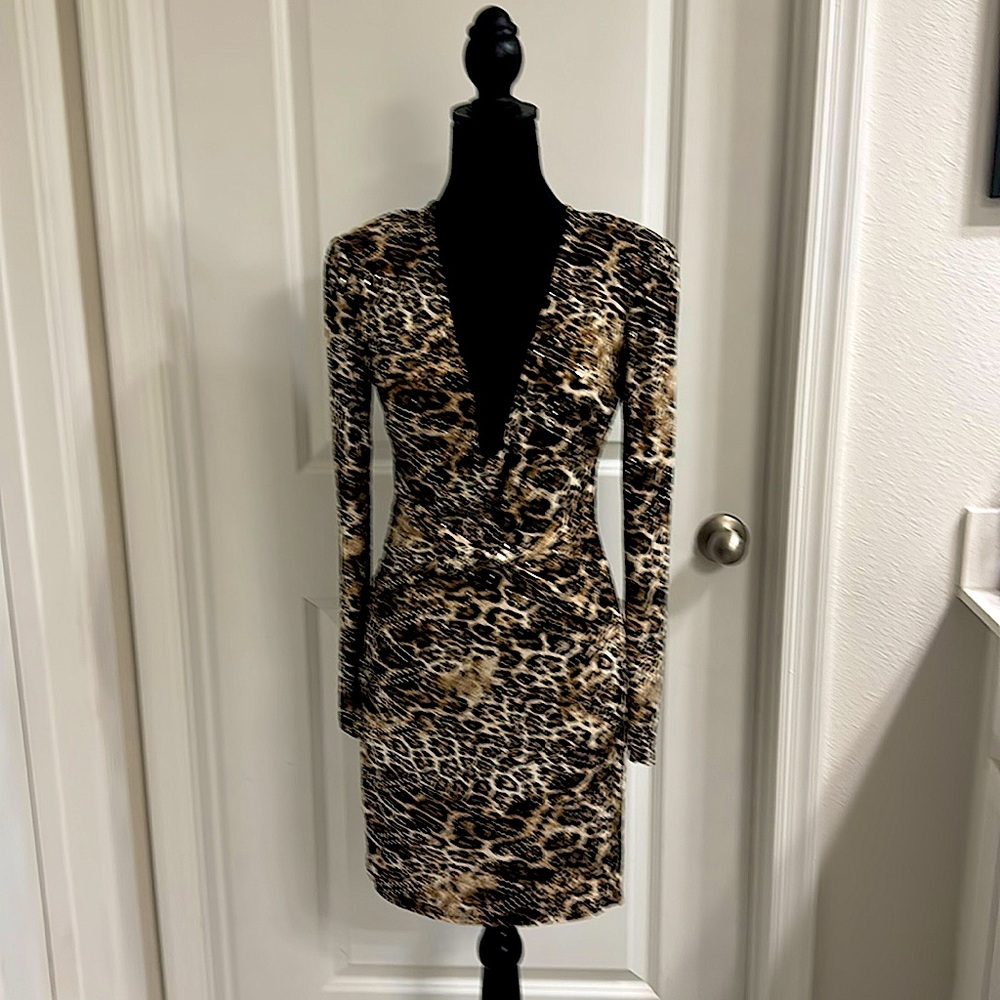 Brand new cheetah print dress from Venus, featuring a stylish design.
